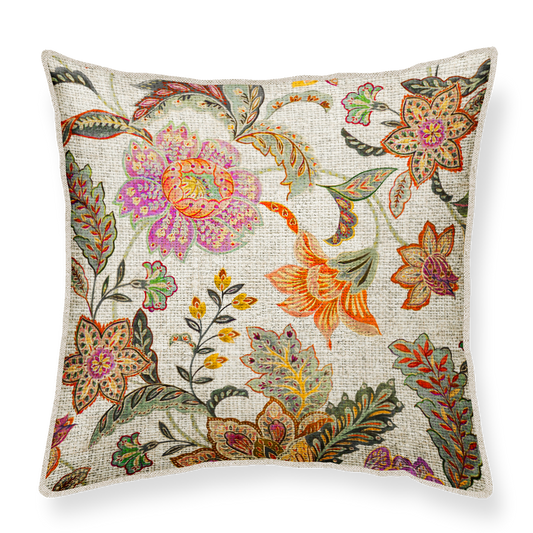 Decorative cushion with colorful floral pattern on a linen background