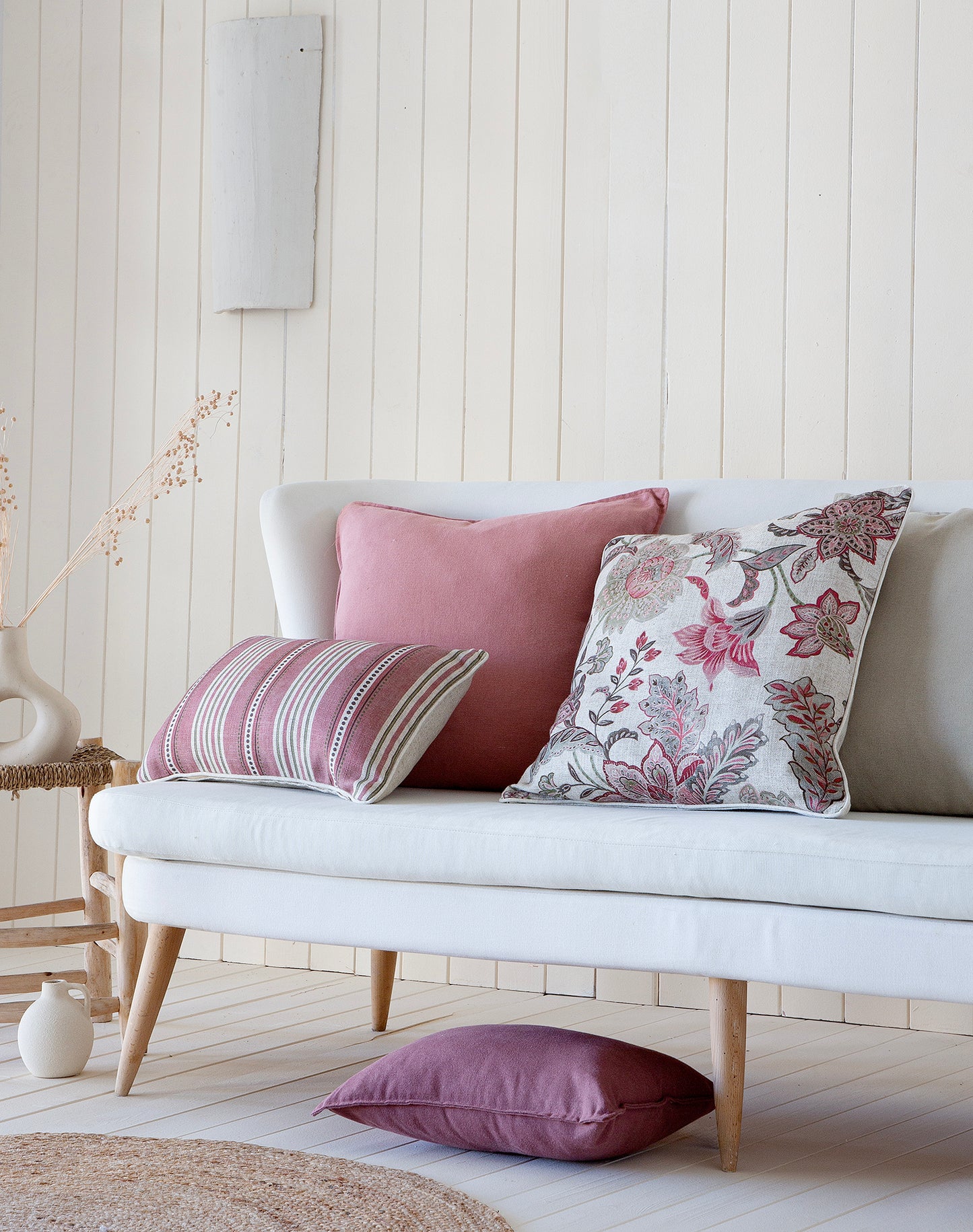 Pink striped Linen & Grace cushion with 30x50 cm size, featuring soft fabric and decorative pattern on the front.