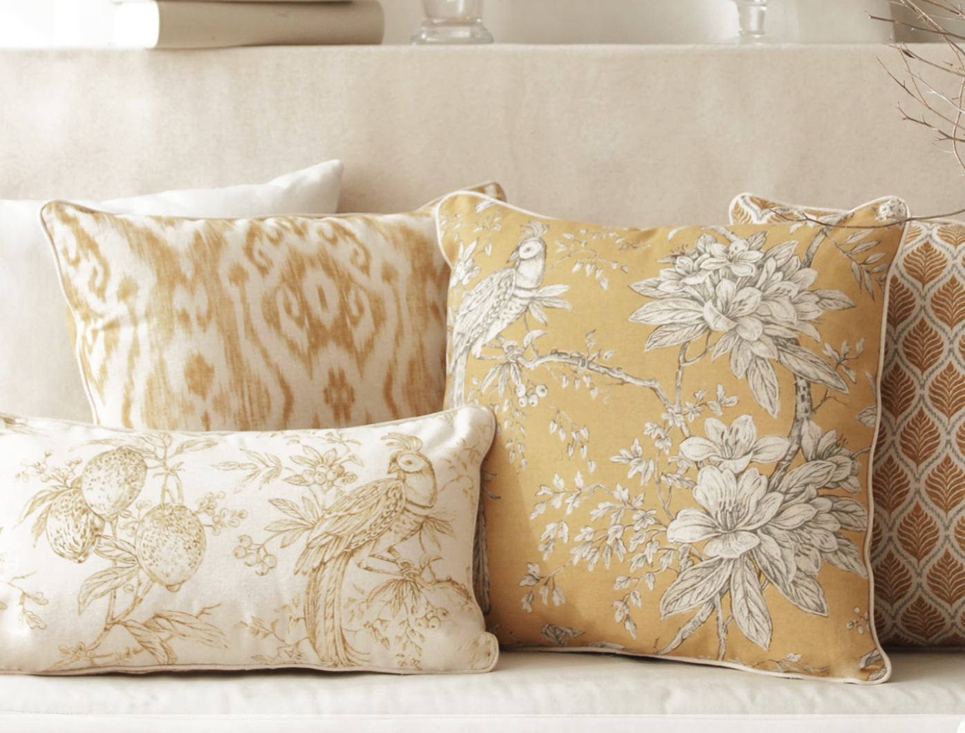 Linen cushions: yellow geometric and floral designs; dimensions 50x50cm; linen piping; breathable linen fabric