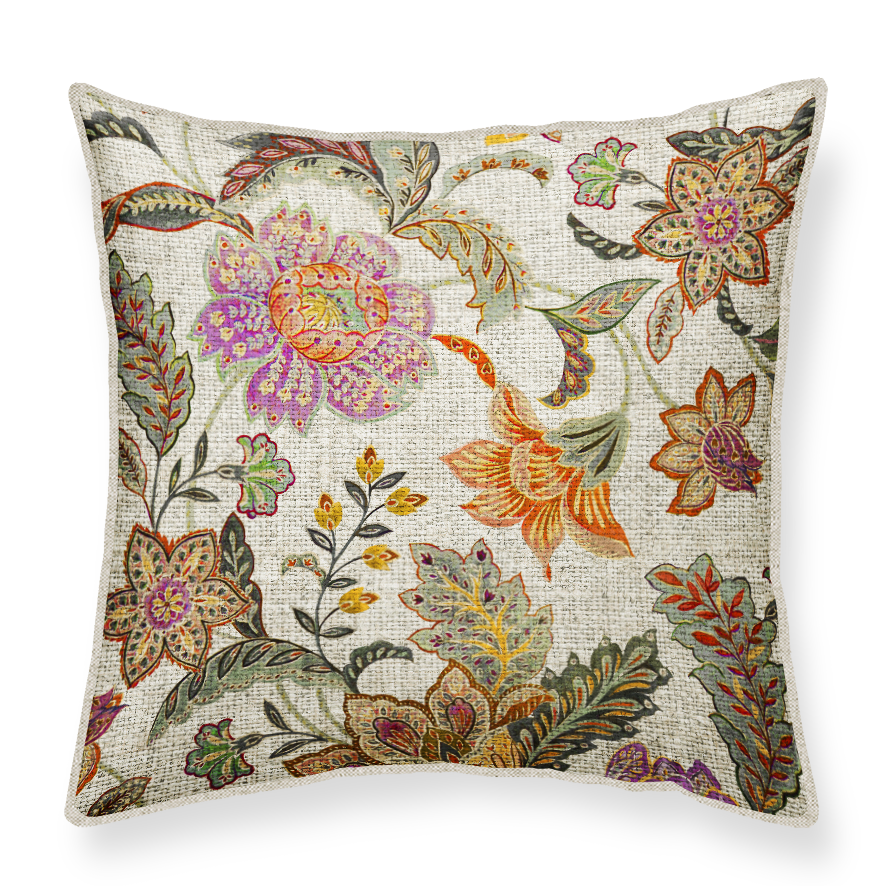 Decorative cushion with colorful floral pattern on a linen background