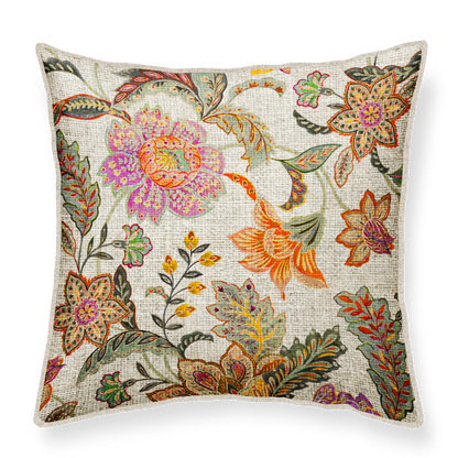 Decorative cushion with colorful floral pattern on a linen background