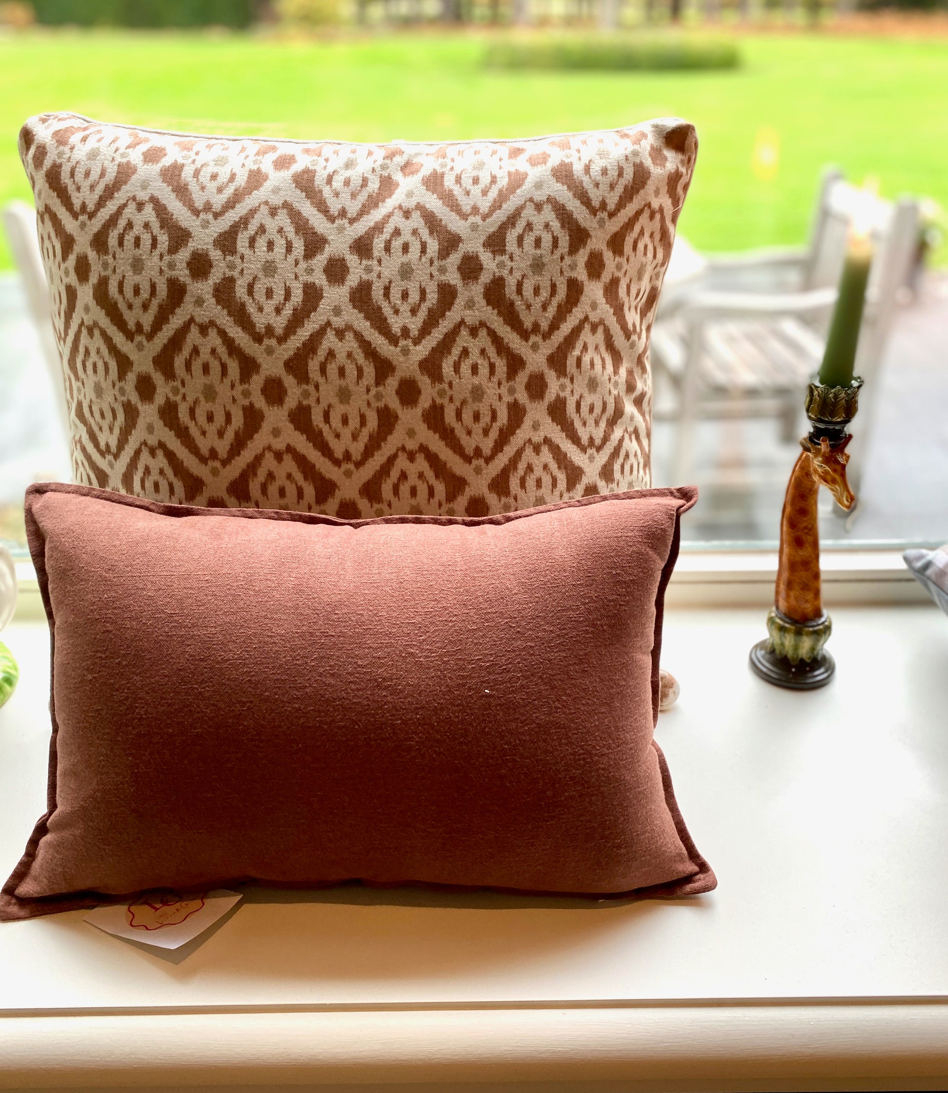 Two patterned cushions 
