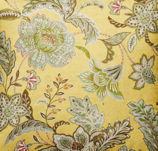 Decorative pillow with floral pattern on a yellow background